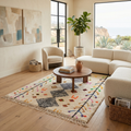 Ivory Azilal Berber rug with charcoal diamonds in a coastal living room with round chair