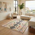 Azilal diamond and tree-of-life rug in a bright modern living room with neutral sofa