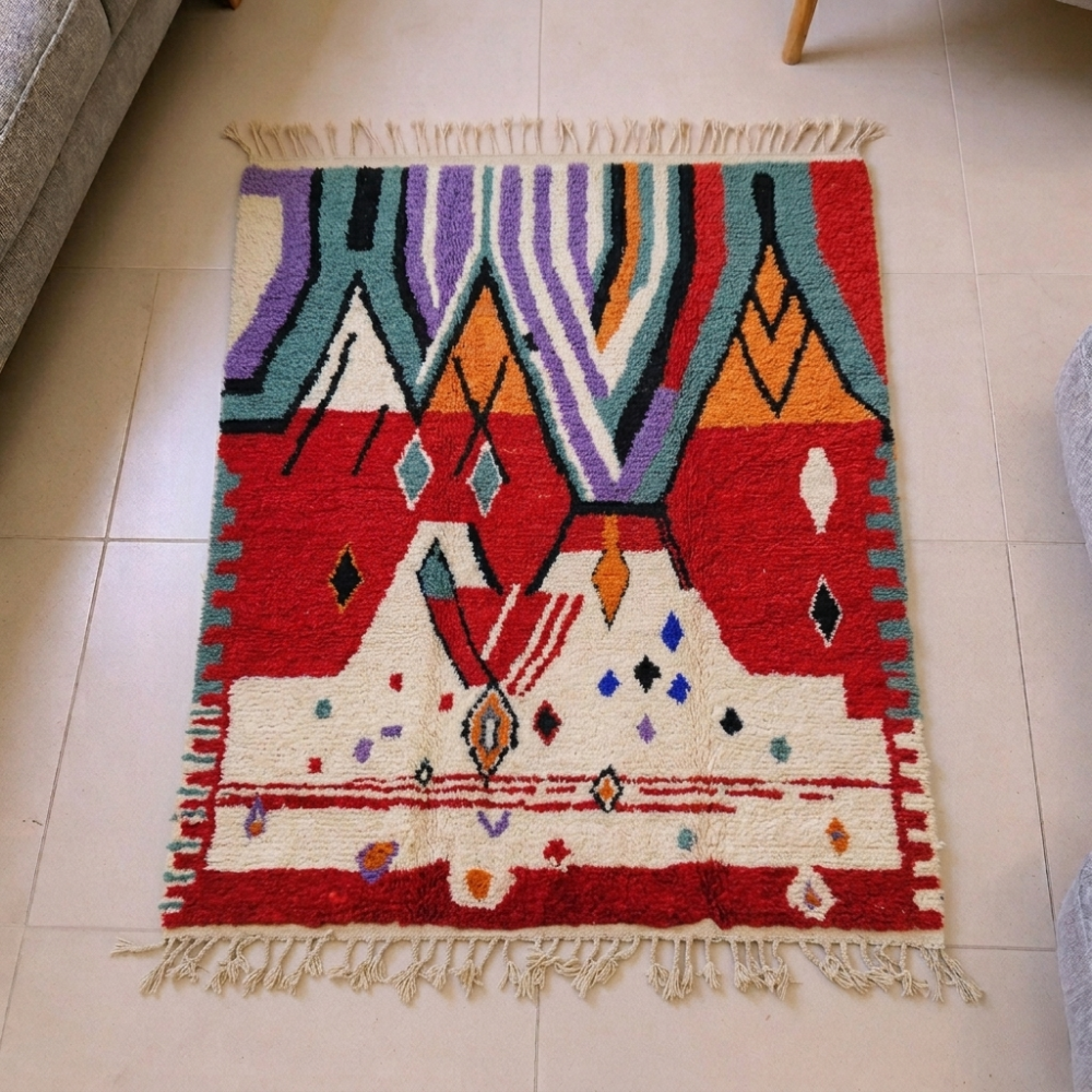 Azilal red wool rug with abstract multicolor Berber art and an ivory lower panel, shown flat