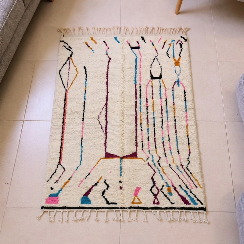 Beni Ourain ivory wool rug with abstract multicolor line motifs, shown flat