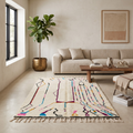 Ivory multicolor Beni Ourain rug in a bright living room with neutral sofa and fiddle-leaf plant