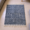Beni Ourain charcoal melange wool rug with subtle ivory abstract marks, shown flat