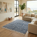 Slate grey Beni Ourain rug with tonal texture in a bright contemporary living room