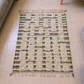 Beni Ourain ivory and black block grid wool rug, shown flat