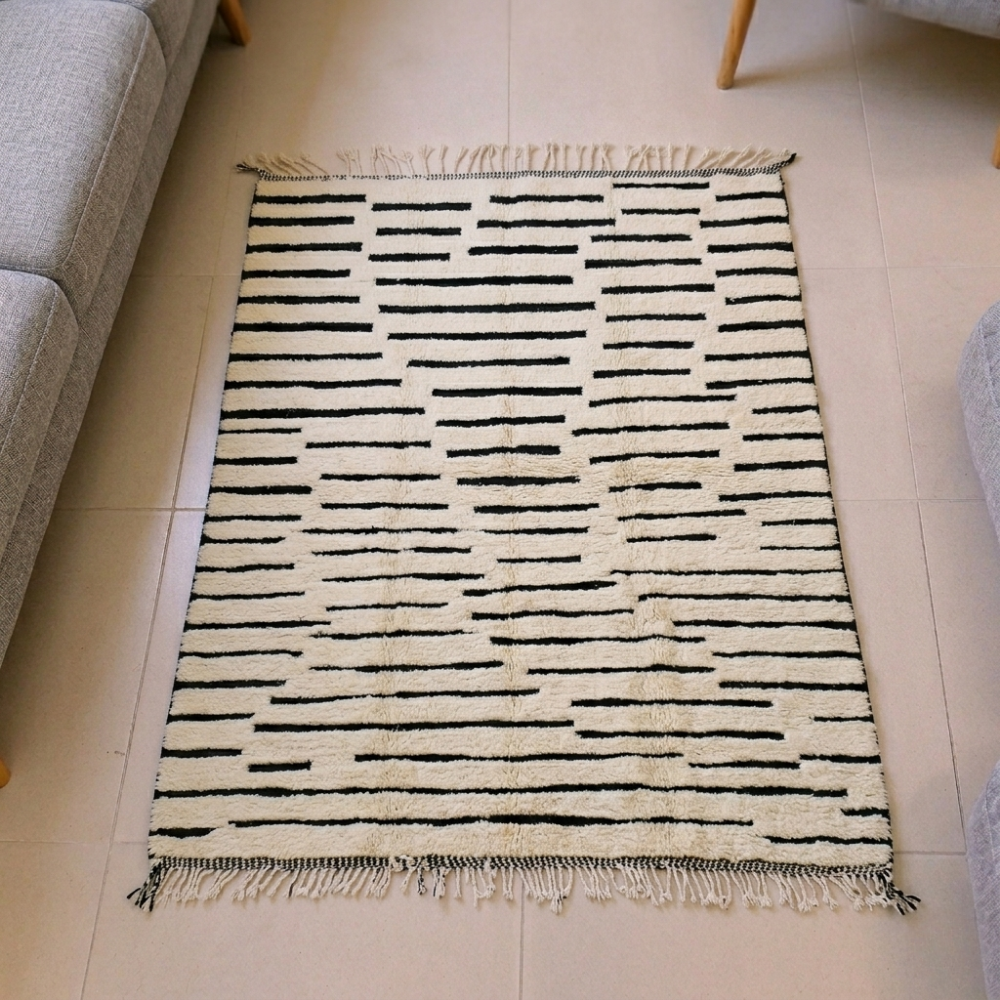 Beni Ourain ivory and black dash line wool rug, shown flat
