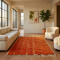 Terracotta and ivory brick Beni Ourain rug in a cosy contemporary room