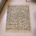 Beni Ourain ivory and black speckle wool rug, shown flat