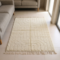 Tone-on-tone ivory Beni Ourain rug with carved relief in a serene bedroom