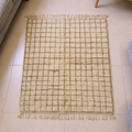 Beni Ourain ivory and gold check wool rug, shown flat