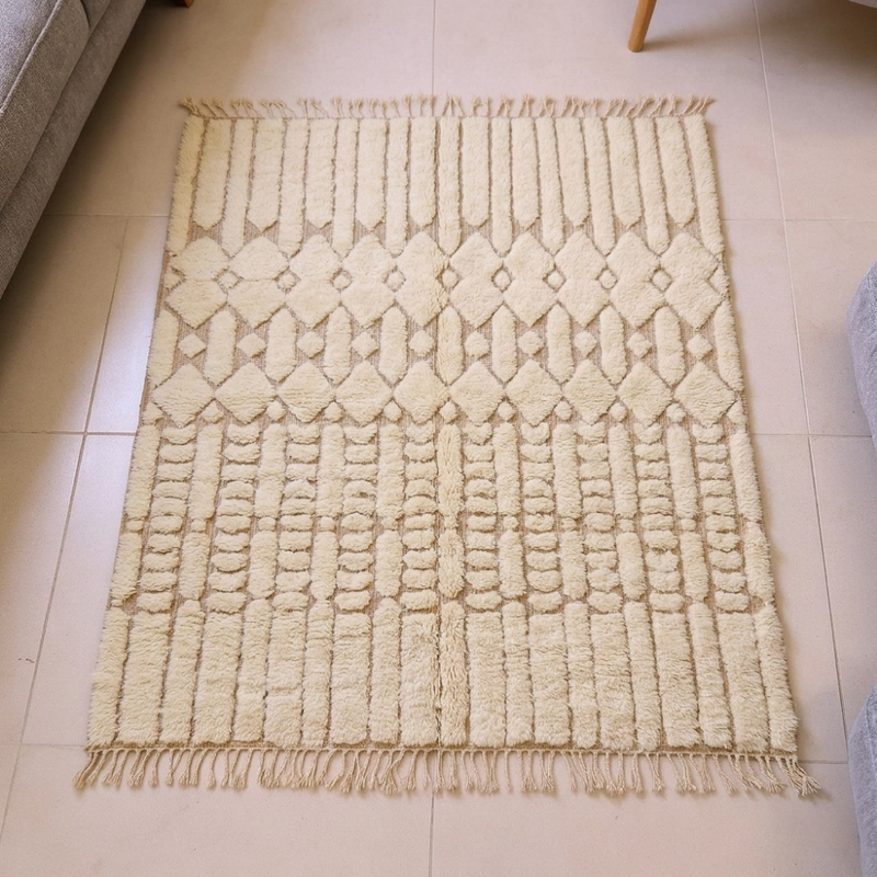 Beni Ourain ivory textured tribal wool rug, shown flat