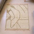 Beni Ourain ivory and beige abstract line wool rug, shown flat
