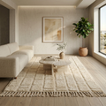 Ivory carved-grid Mrirt high-pile rug styled in a bright neutral living room