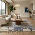 Indigo and ivory abstract Mrirt rug styled in a bright living room