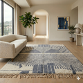 Blue and ivory Moroccan Mrirt abstract rug in a sunlit interior