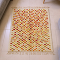 Mrirt multicolor checkerboard flatweave rug in red, mustard and green squares, shown flat