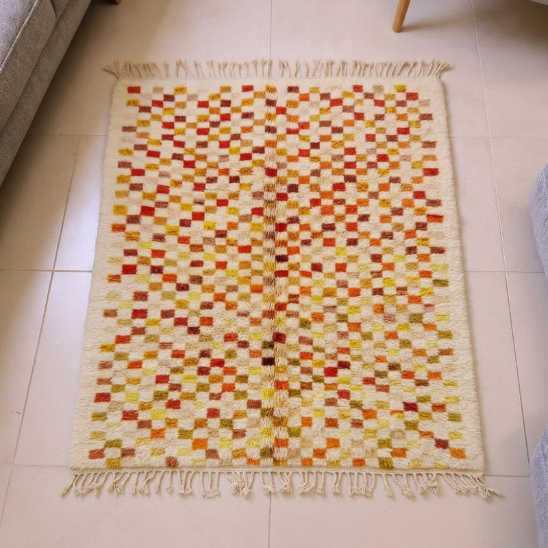 Mrirt multicolor checkerboard flatweave rug in red, mustard and green squares, shown flat