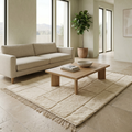Ivory carved-brick Mrirt high-pile rug styled in a bright living room