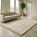 Architectural ivory Moroccan Mrirt rug in a sunlit minimalist interior