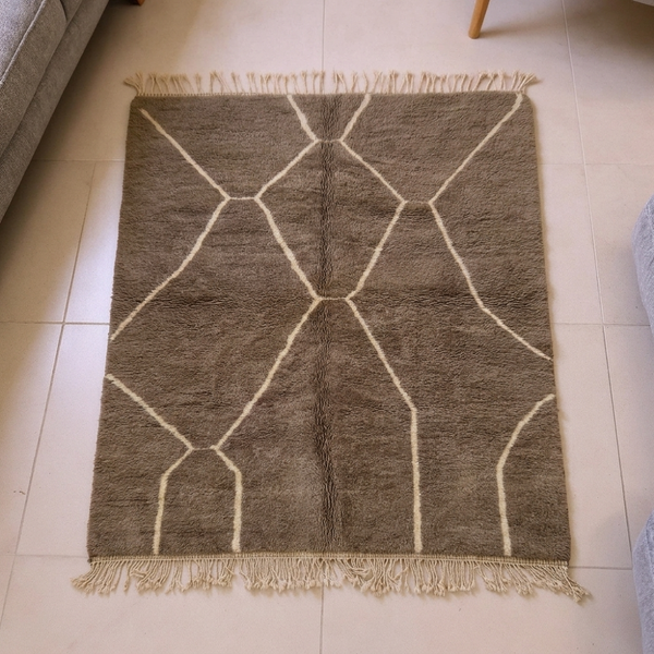 Mrirt brown plush wool rug with organic ivory line lattice, shown flat