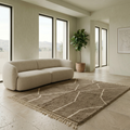Warm mocha Moroccan Mrirt line rug in a sunlit interior