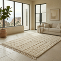 Minimalist ivory Moroccan Mrirt rug in a sunlit interior