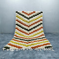 Beni Ourain rug in modern living room with neutral furniture