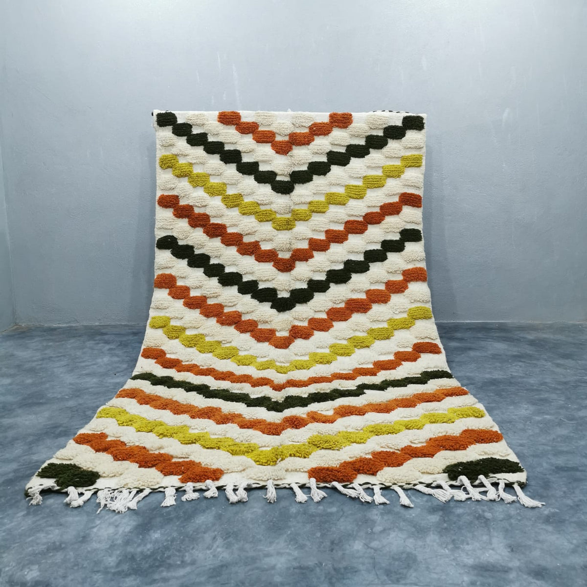 Beni Ourain rug in modern living room with neutral furniture